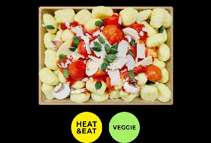 Gesunde und frische Bagels, Gerichte, Salate, Snacks, Wraps und Getränke aus einem Automaten: Gnocchi | Tomaten